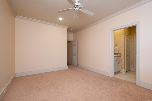 unfurnished bedroom featuring recessed lighting, ornamental molding, baseboards, and light colored carpet