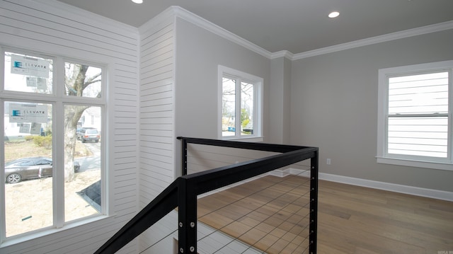 stairs featuring baseboards, recessed lighting, wood finished floors, and crown molding