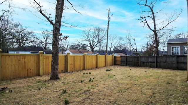 view of yard featuring a fenced backyard