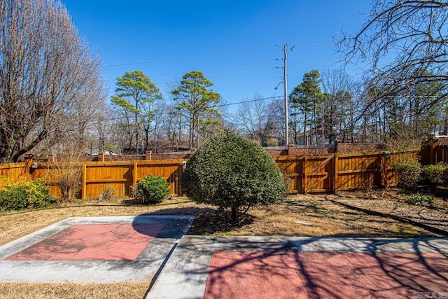 view of yard with a gate and fence