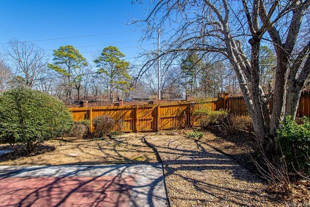 view of yard with fence