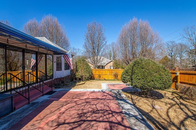 view of patio with fence