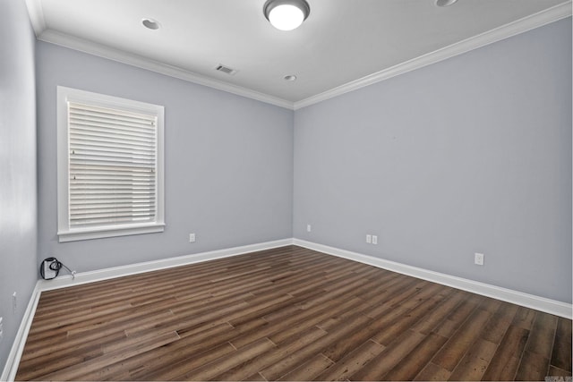 unfurnished room featuring baseboards, visible vents, ornamental molding, and dark wood-style flooring