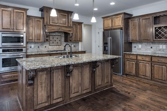 kitchen with crown molding, dark wood-style flooring, stainless steel appliances, and a sink