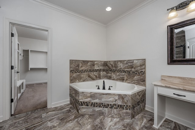 bathroom with vanity, baseboards, marble finish floor, a bath, and crown molding