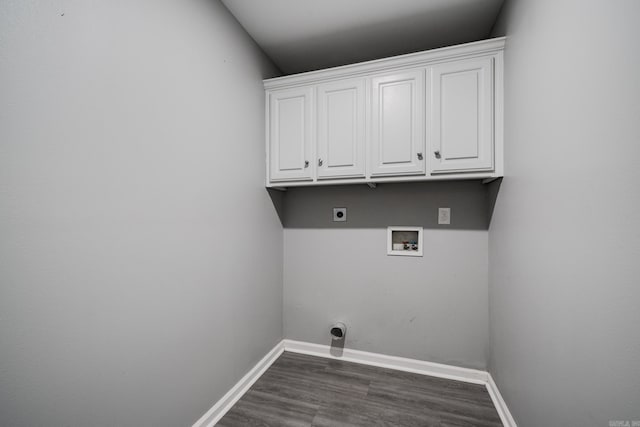 washroom with washer hookup, dark wood finished floors, cabinet space, electric dryer hookup, and baseboards