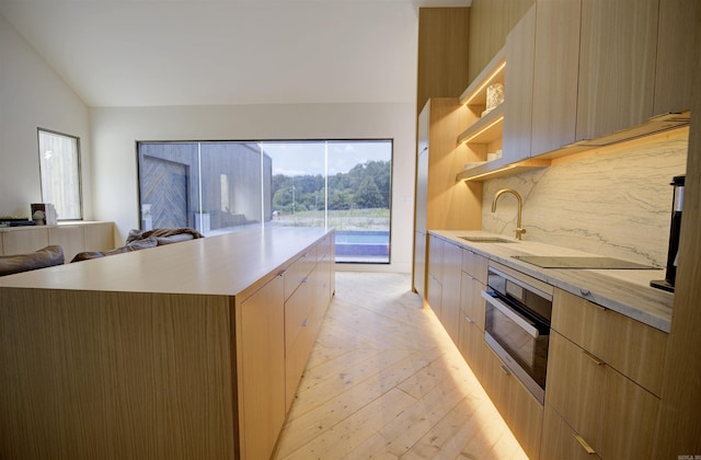 kitchen featuring open shelves, a sink, modern cabinets, oven, and black electric cooktop