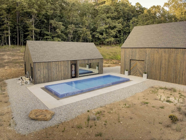 pool with an outdoor structure