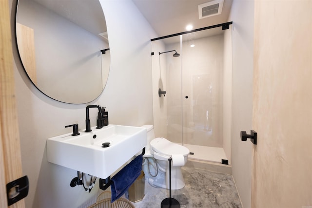 bathroom with toilet, a stall shower, and visible vents