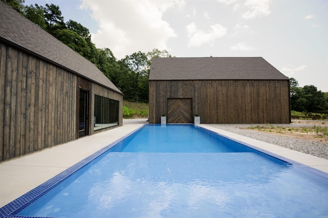 outdoor pool with an outdoor structure