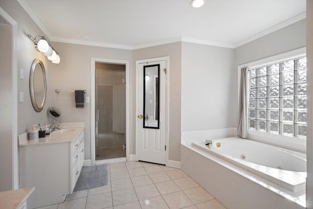 full bathroom featuring tile patterned flooring, vanity, a jetted tub, a stall shower, and crown molding