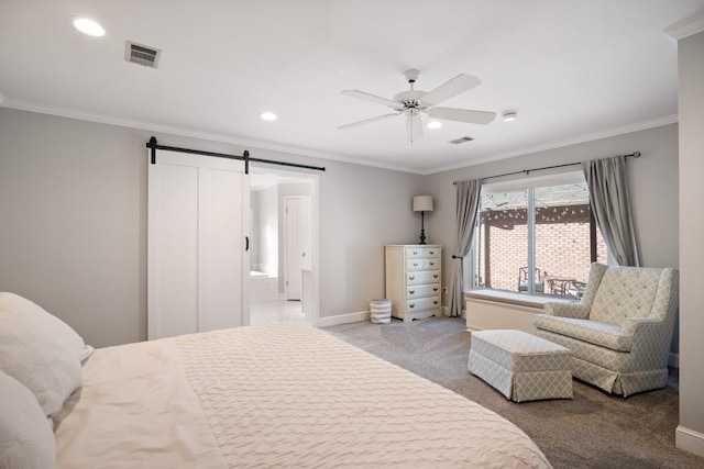 bedroom featuring visible vents, a barn door, ornamental molding, light carpet, and baseboards