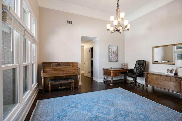 sitting room with ornamental molding, hardwood / wood-style floors, visible vents, and baseboards