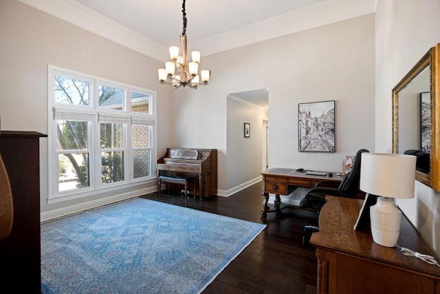 office featuring a chandelier, dark wood-style flooring, crown molding, and baseboards