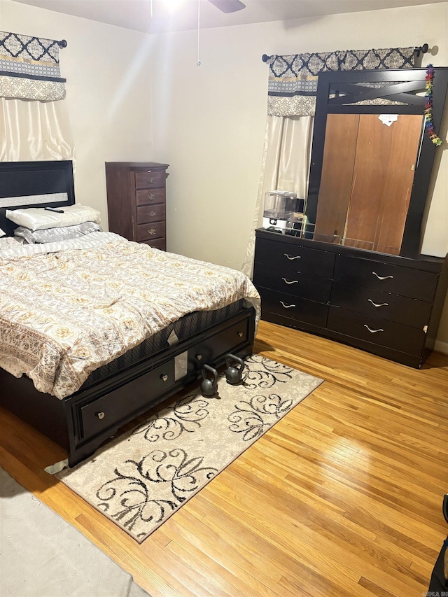 bedroom with light wood finished floors