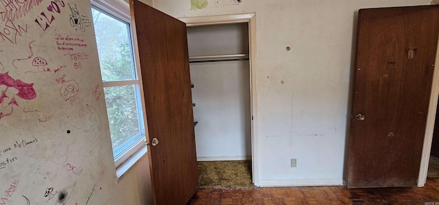 unfurnished bedroom featuring a closet