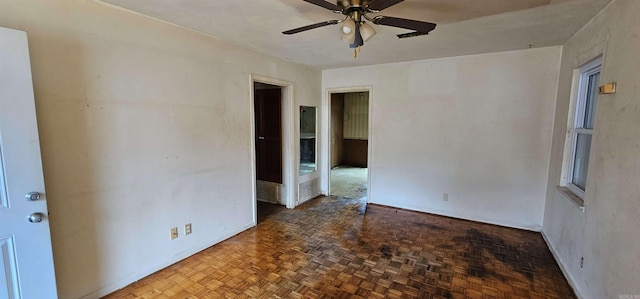 unfurnished room featuring ceiling fan