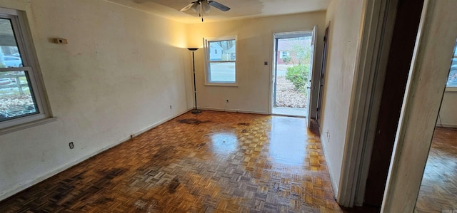 interior space with a ceiling fan