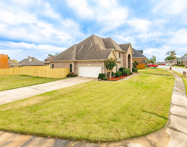 view of property exterior featuring brick siding, a yard, concrete driveway, fence, and a garage