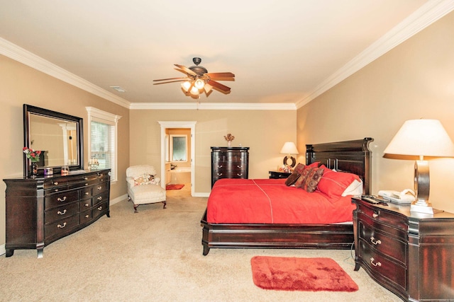 bedroom with baseboards, connected bathroom, ornamental molding, and carpet flooring