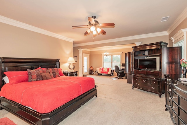 bedroom featuring decorative columns, visible vents, light colored carpet, crown molding, and ceiling fan with notable chandelier