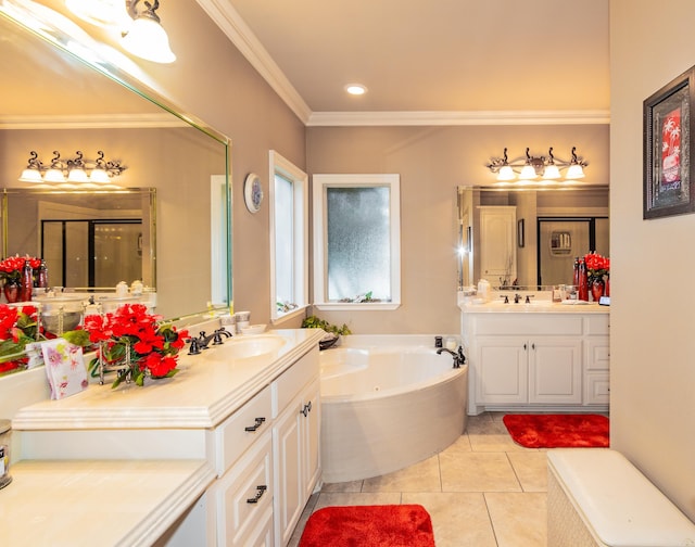 bathroom featuring ornamental molding, a sink, a garden tub, tile patterned flooring, and two vanities