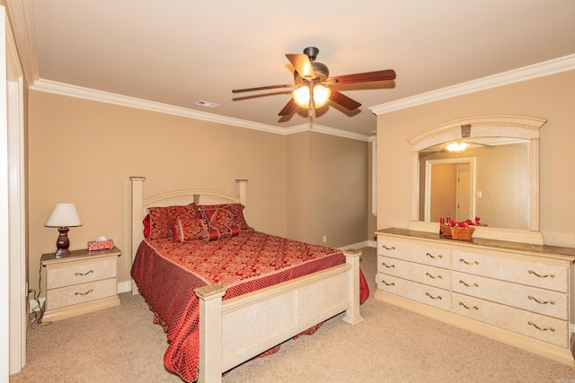 carpeted bedroom featuring visible vents, crown molding, and ceiling fan