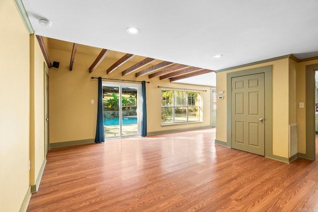 spare room with recessed lighting, visible vents, baseboards, beam ceiling, and light wood finished floors