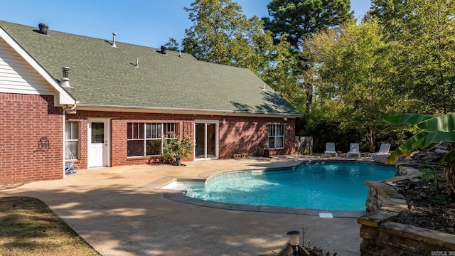 view of pool featuring a fenced in pool and a patio area