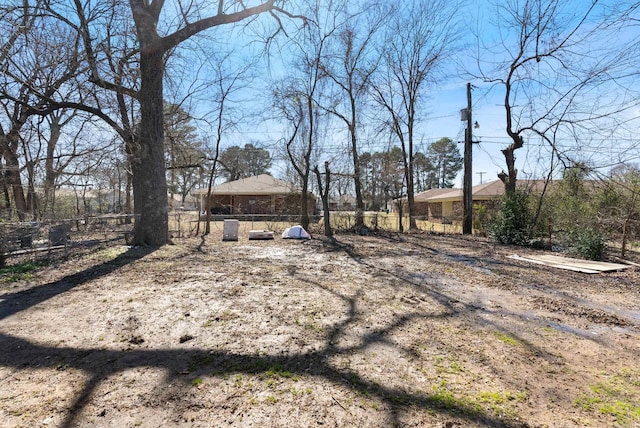 view of yard featuring fence