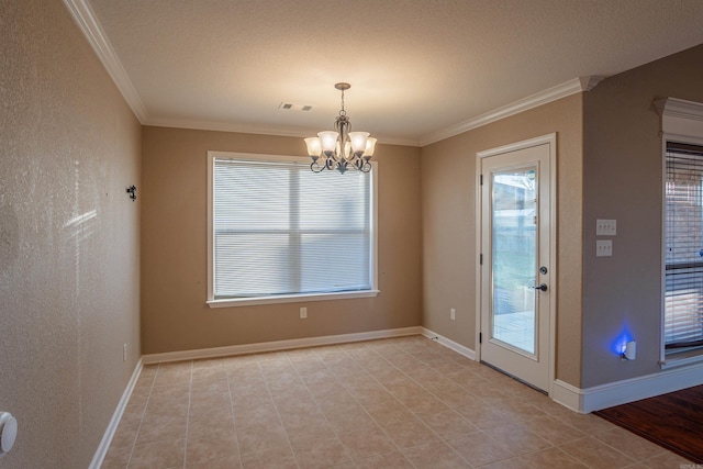 interior space with a notable chandelier, baseboards, crown molding, and a textured wall