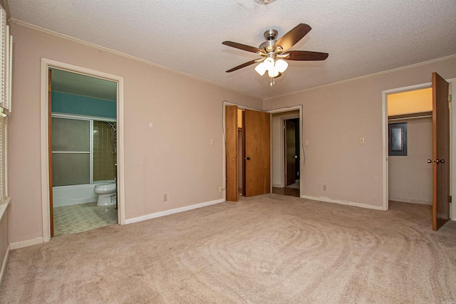 681 Sharp Ave, Camden, AR 71701 - unfurnished bedroom featuring crown molding, a textured ceiling, carpet flooring, connected bathroom, and ceiling fan