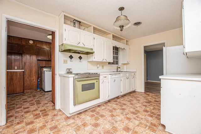 681 Sharp Ave, Camden, AR 71701 - kitchen featuring white appliances, under cabinet range hood, light countertops, white cabinetry, and a textured ceiling
