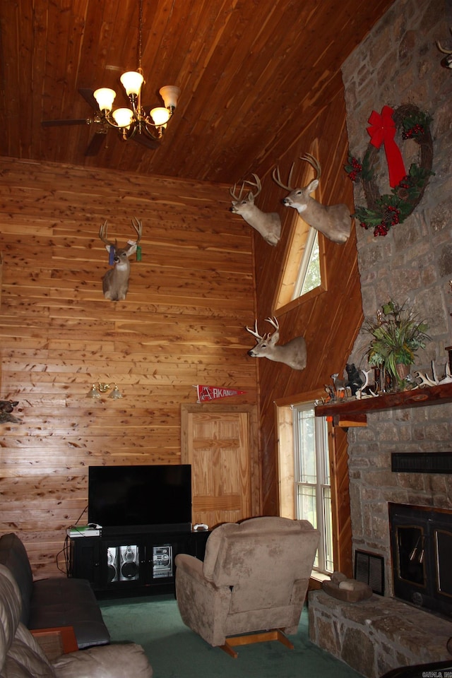 708 Kid Phillips Rd, Marshall, AR 72650 - living area with wooden ceiling, plenty of natural light, wooden walls, and a fireplace