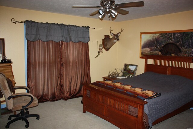 708 Kid Phillips Rd, Marshall, AR 72650 - bedroom featuring carpet, ceiling fan, and a textured ceiling