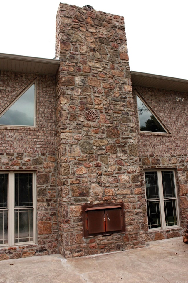 708 Kid Phillips Rd, Marshall, AR 72650 - interior space featuring a chimney and a glass covered fireplace