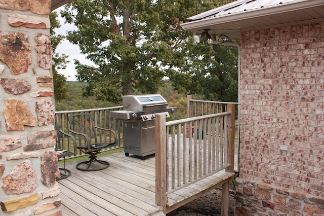 708 Kid Phillips Rd, Marshall, AR 72650 - wooden deck featuring a grill