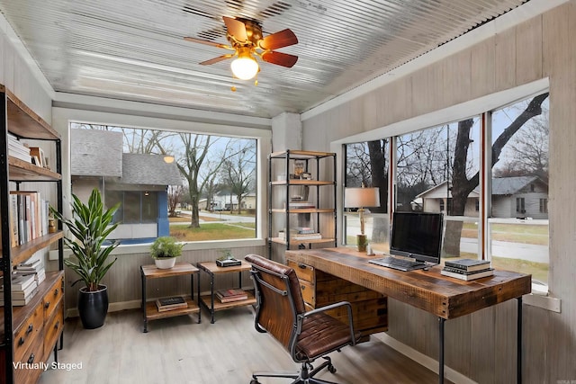 office area with a ceiling fan and wood finished floors