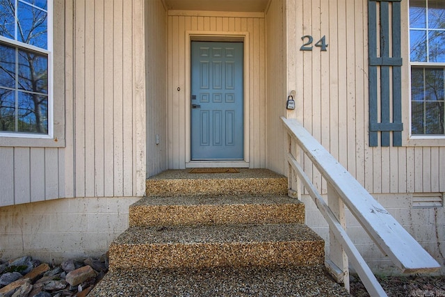 view of exterior entry featuring crawl space