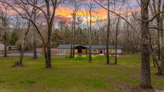 35 S Woodland, Conway, AR 72032 - view of front of house featuring a porch and a yard