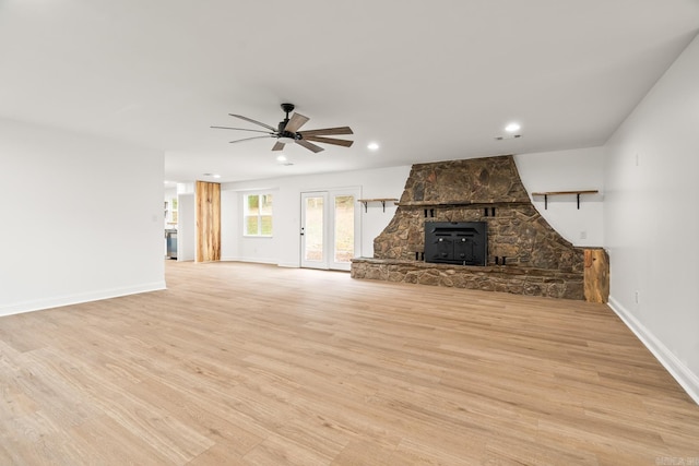 unfurnished living room with light wood finished floors, recessed lighting, visible vents, ceiling fan, and baseboards