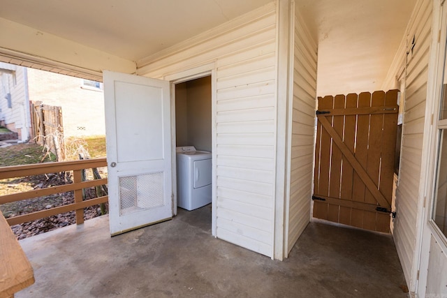 view of exterior entry featuring washer / clothes dryer