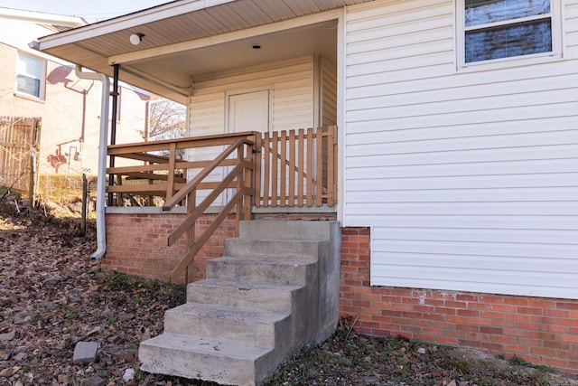 doorway to property with a porch