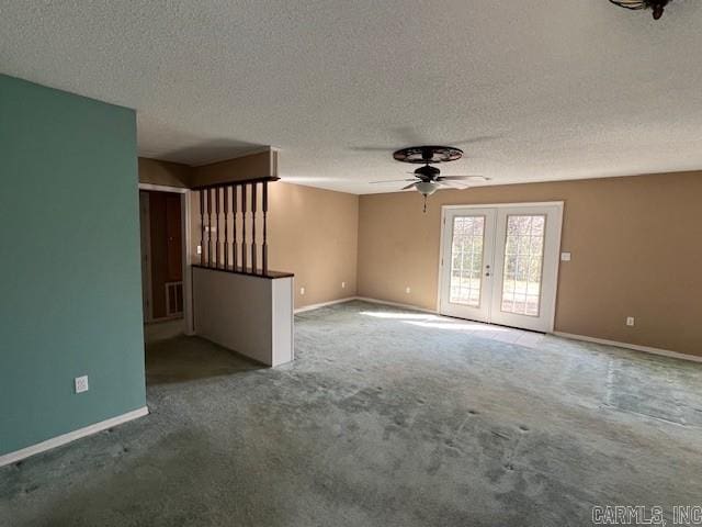 unfurnished living room with french doors, visible vents, baseboards, and carpet flooring