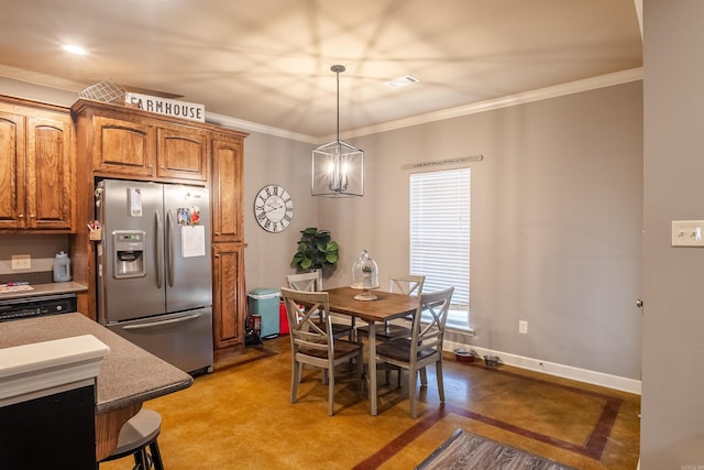 kitchen featuring brown cabinets, stainless steel fridge with ice dispenser, visible vents, ornamental molding, and baseboards