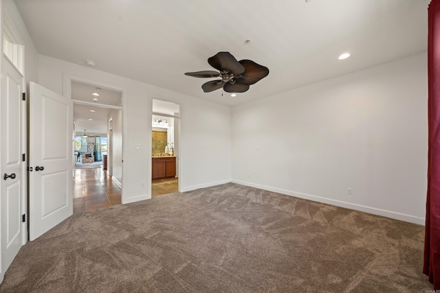 empty room featuring a ceiling fan, carpet, baseboards, and recessed lighting