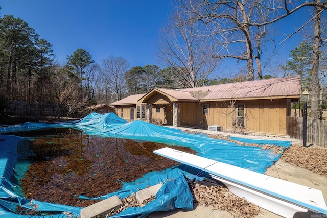 view of swimming pool featuring fence and a fenced in pool