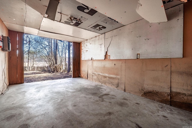 interior space with unfinished concrete flooring