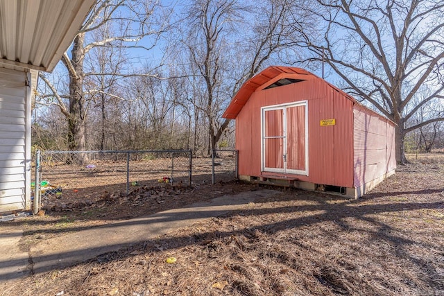 view of outdoor structure featuring an outdoor structure and fence