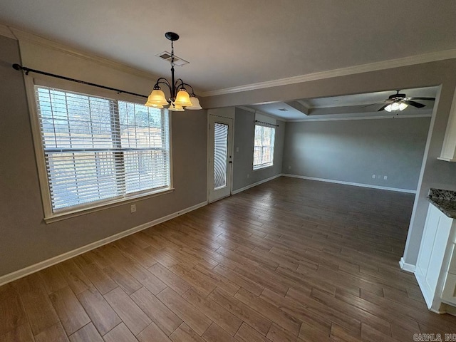 spare room with baseboards, visible vents, ornamental molding, dark wood-type flooring, and ceiling fan with notable chandelier